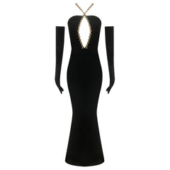 Black evening gown with long sleeves and a decorative back
