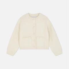 White-colored cardigan on a white background