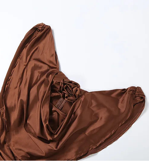 Brown satin fabric on a white background