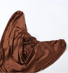 Brown satin fabric on a white background