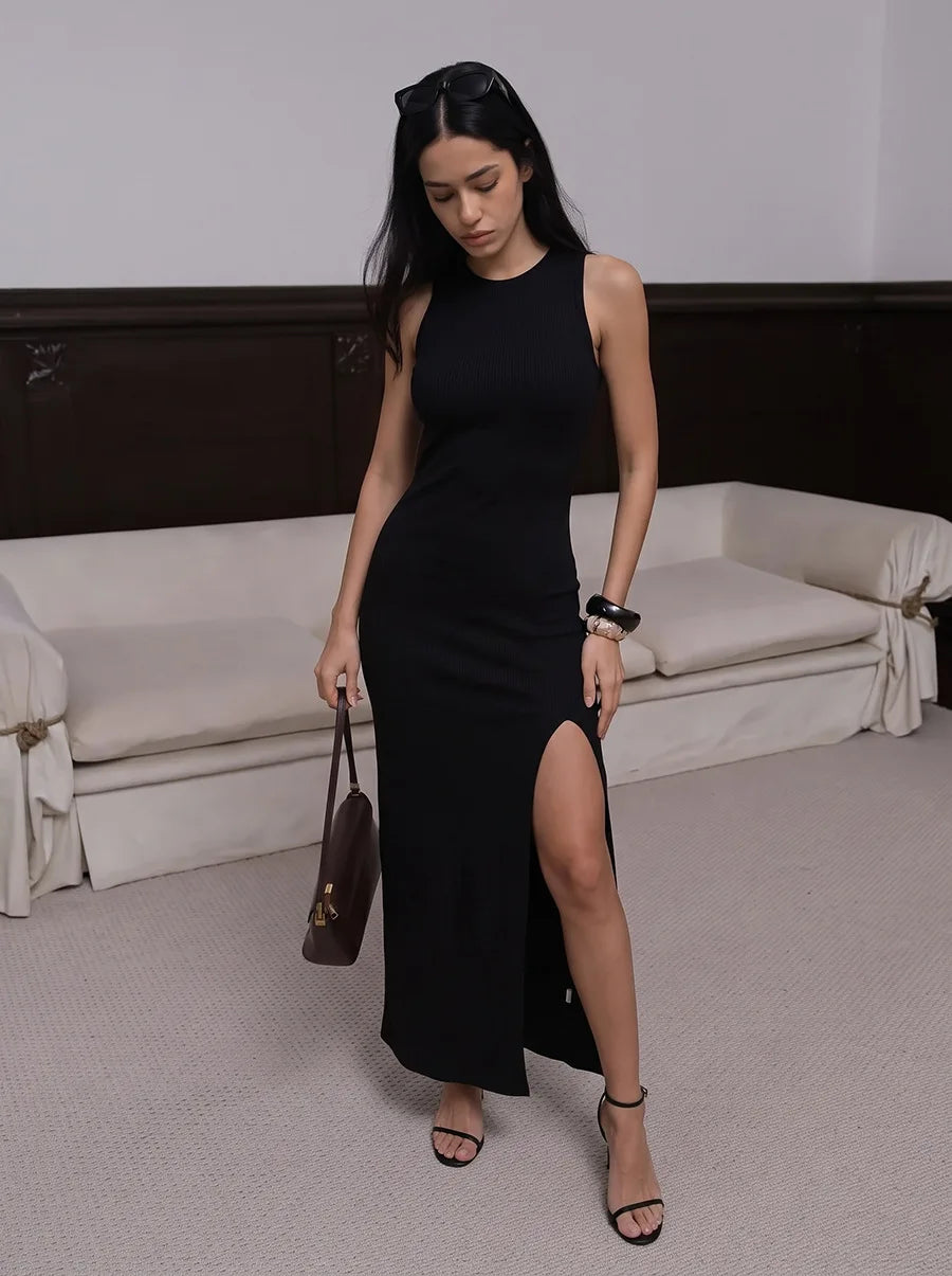 Black sleeveless knit maxi dress with side slit
