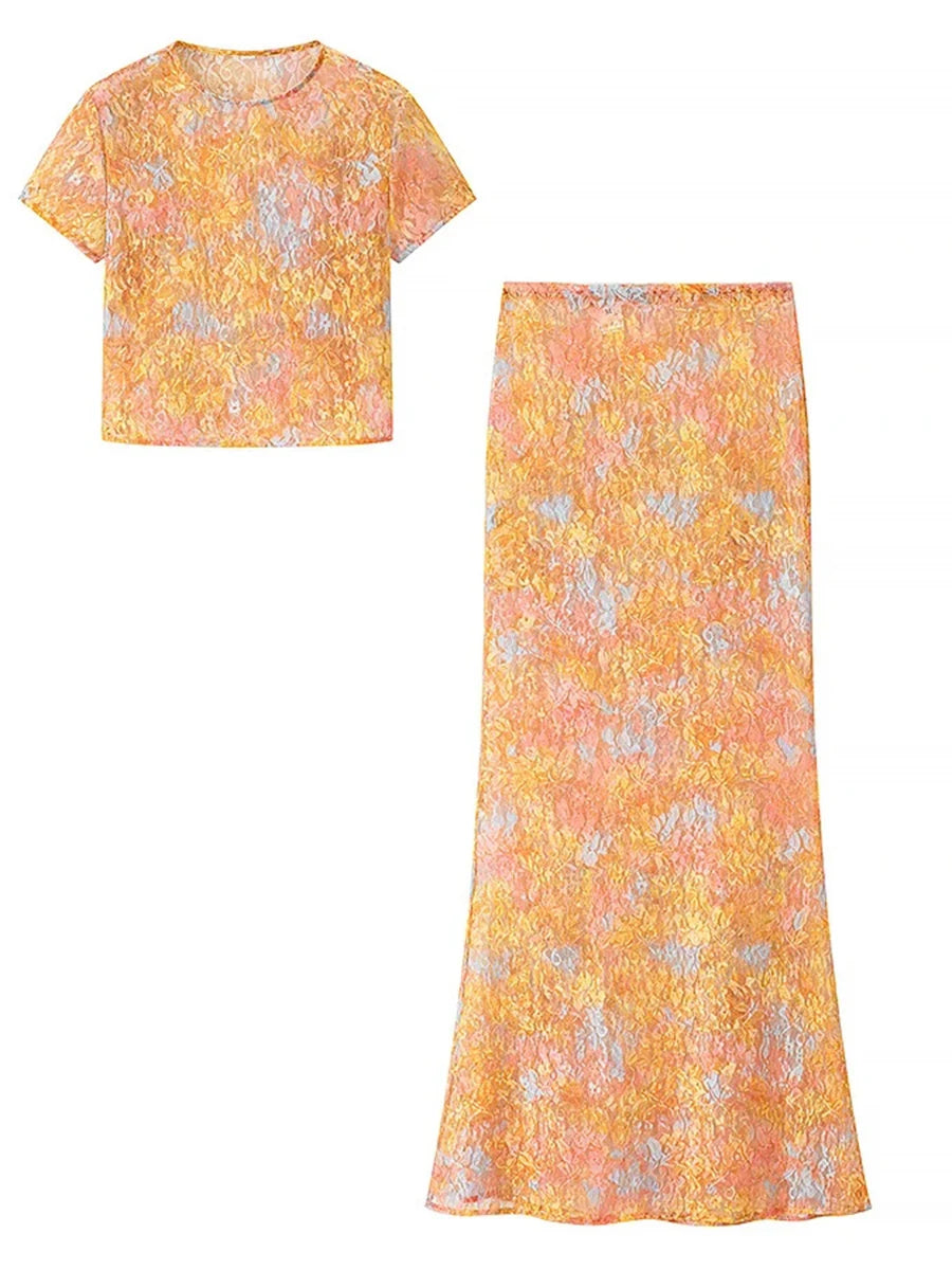 Yellow floral dress with a matching skirt on a white background