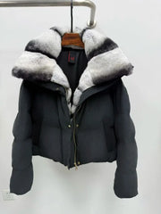 Black puffer jacket with fur-lined hood