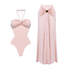 Two-piece ruched bandeau swimsuit and maxi skirt set displayed