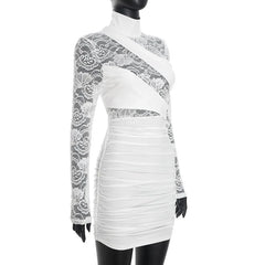 White dress with lace detailing on a mannequin against a white background