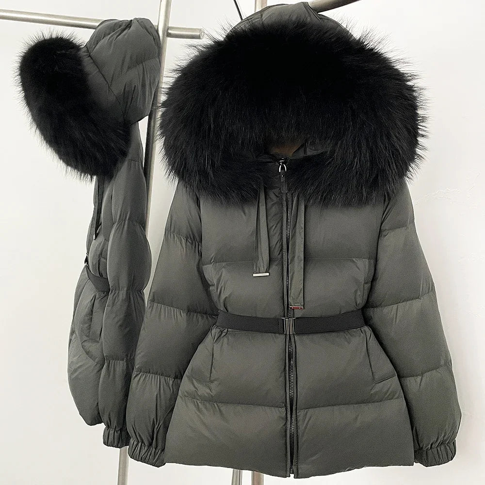 Gray puffer jacket with black fur hood on a white background