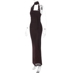 Black halter neck dress on a mannequin against a white background