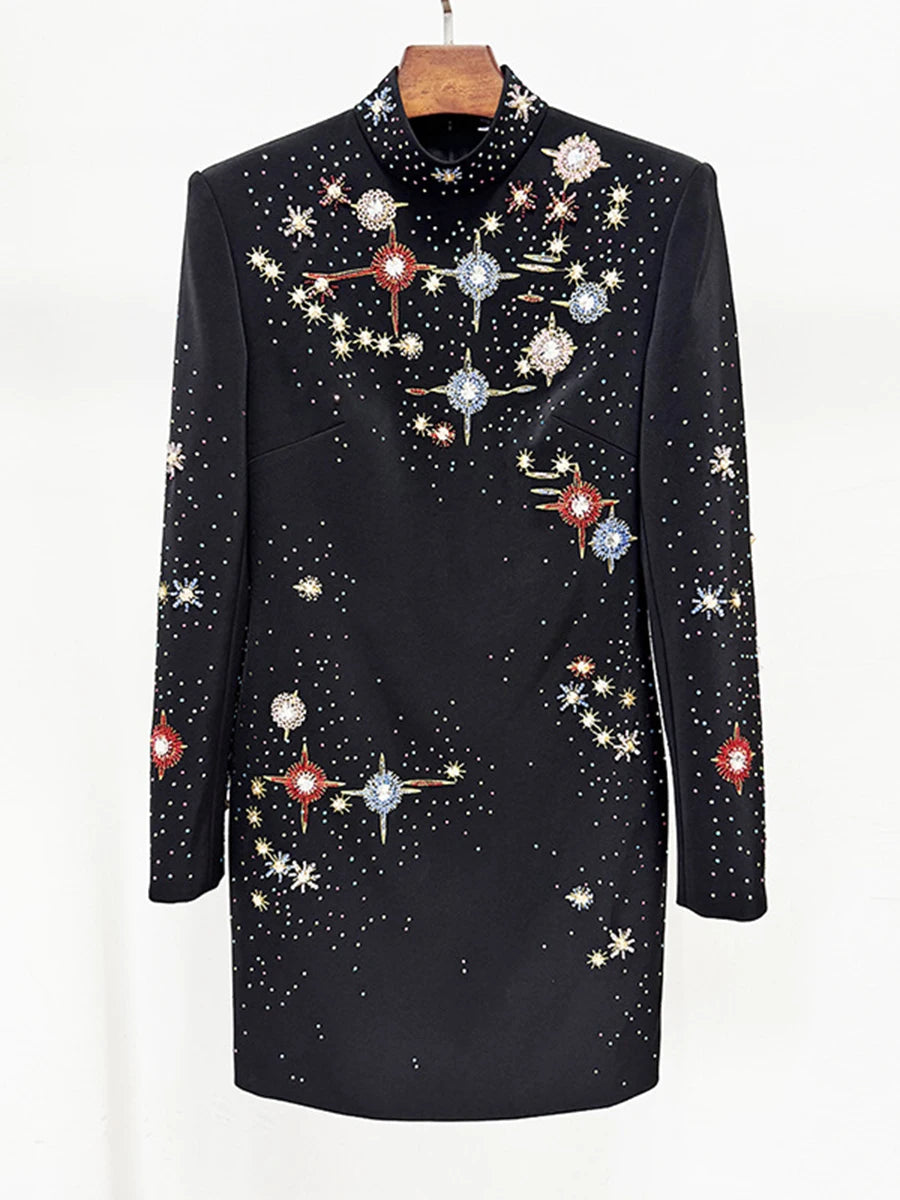 Black dress with celestial pattern on a white background