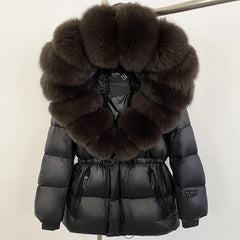 Black puffer jacket with large fur collar on a white background