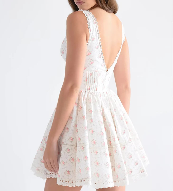 White floral dress with a backless design on a white background