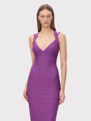 Purple dress worn by a model on a white background