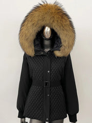 Black quilted jacket with a large fur hood on a mannequin against a white background