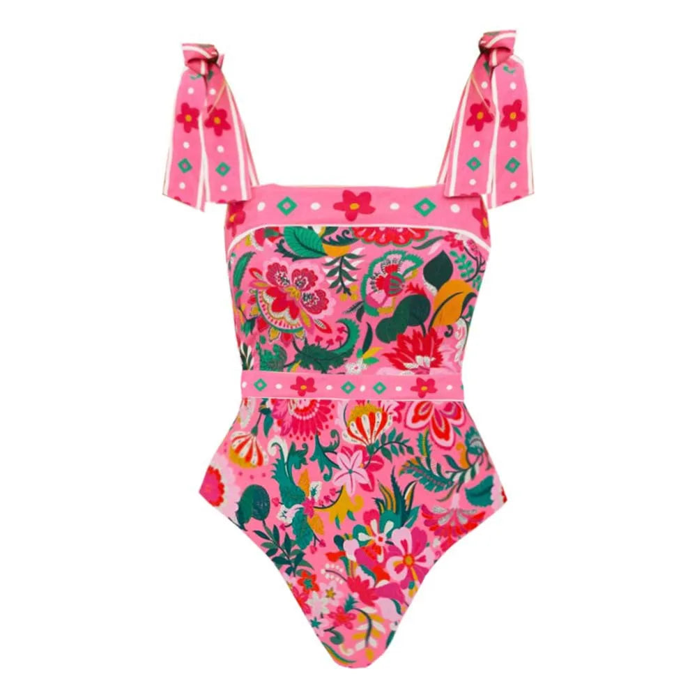 Close-up view of a floral print one-piece swimsuit.