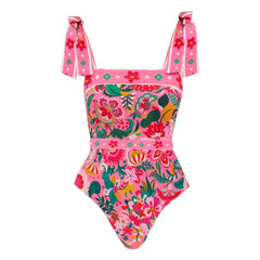 Close-up view of a floral print one-piece swimsuit.