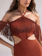 Brown fringe dress worn by a model against a neutral background