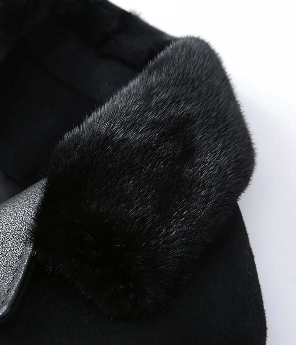 Close-up of black fur texture on a white background