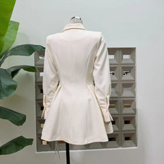 Back view of off-white tailored A-line mini dress