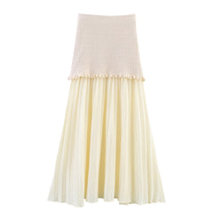 Two-tone skirt with beige top and white bottom on a white background
