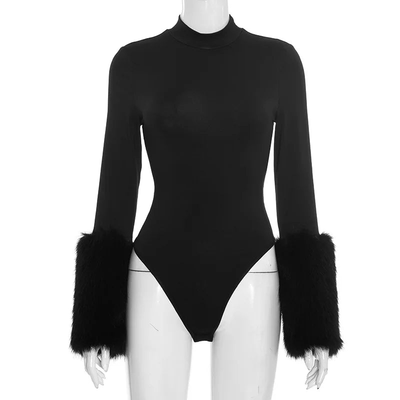 Black bodysuit with fur cuffs on a mannequin against a white background
