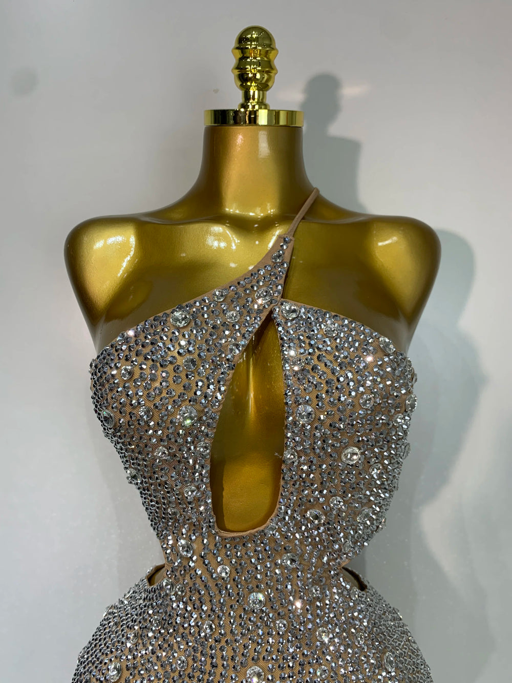 Diagonal collar cut-out crystal mesh mini dress close-up front