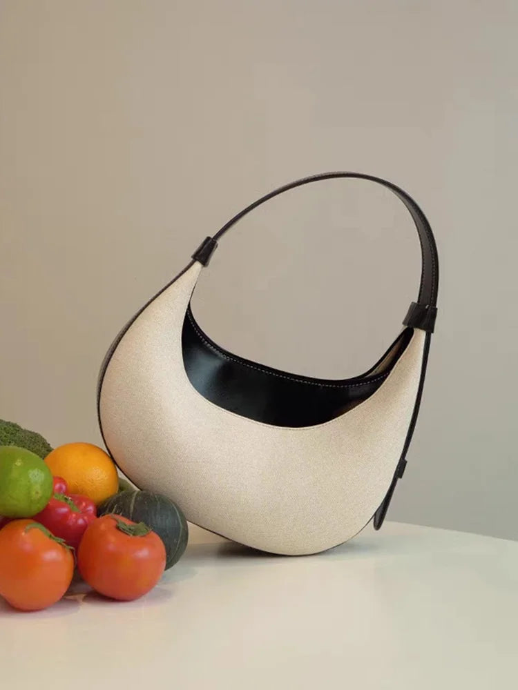 minimalist hobo bag in cream and black