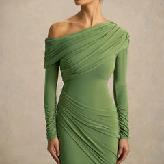 Green one-shoulder dress with long sleeves on a neutral background