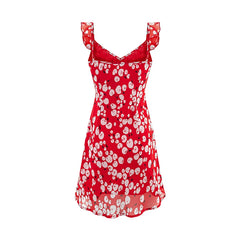 Red cherry print mini dress with ruffle straps and a tie V-neck, back view.