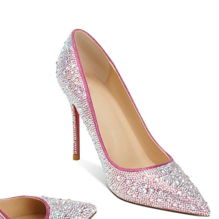 Sparkling high-heeled shoe with pink trim