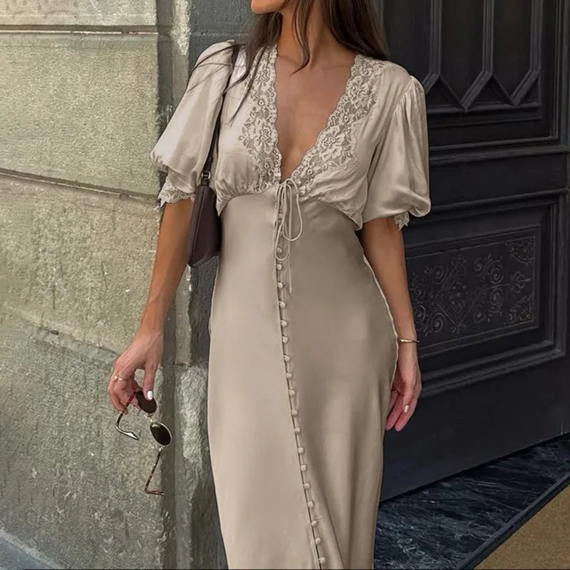 Maxi dress with lace V-neck and puff sleeves