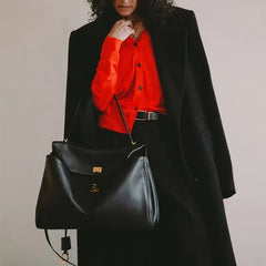 Soft leather Kelly-style tote with gold lock and top handle