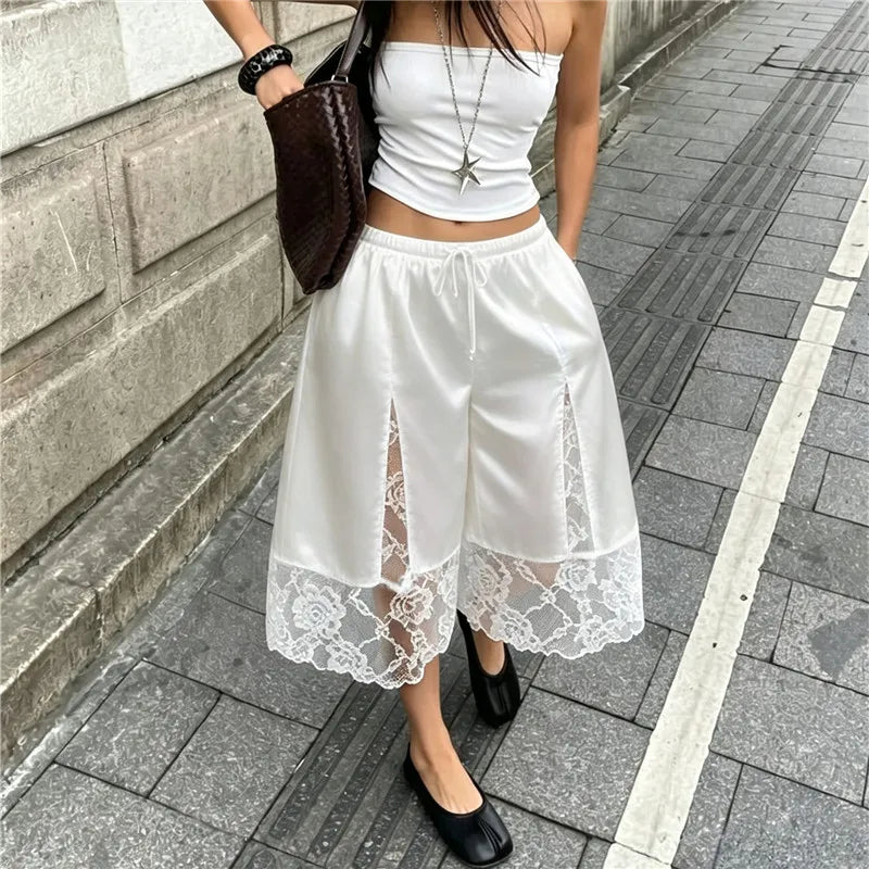 White lace trim split capri shorts on street