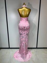 Strapless sequined form-fitting floor-length gown