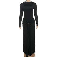 Black long-sleeve gown on a mannequin against a white background