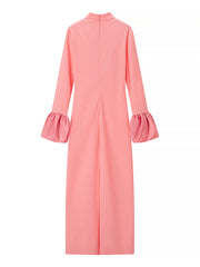 Pink dress with ruffled sleeves on a white background