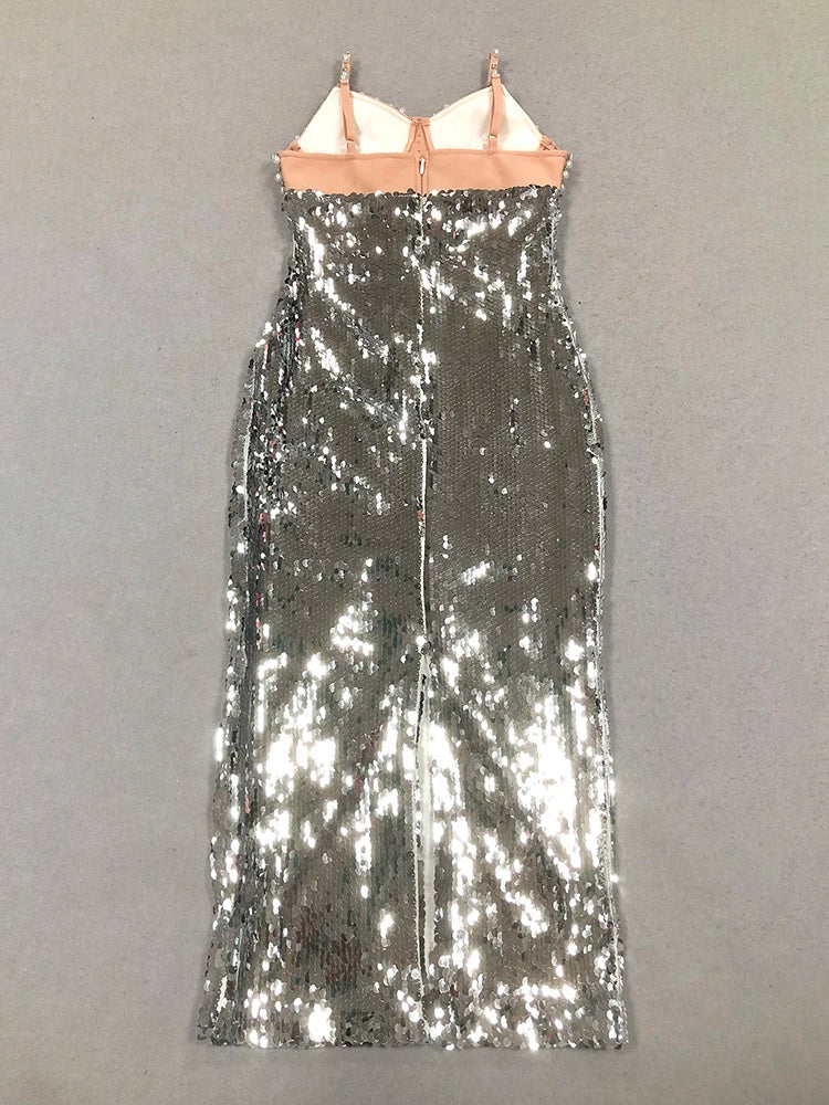 Silver sequin dress on a gray background