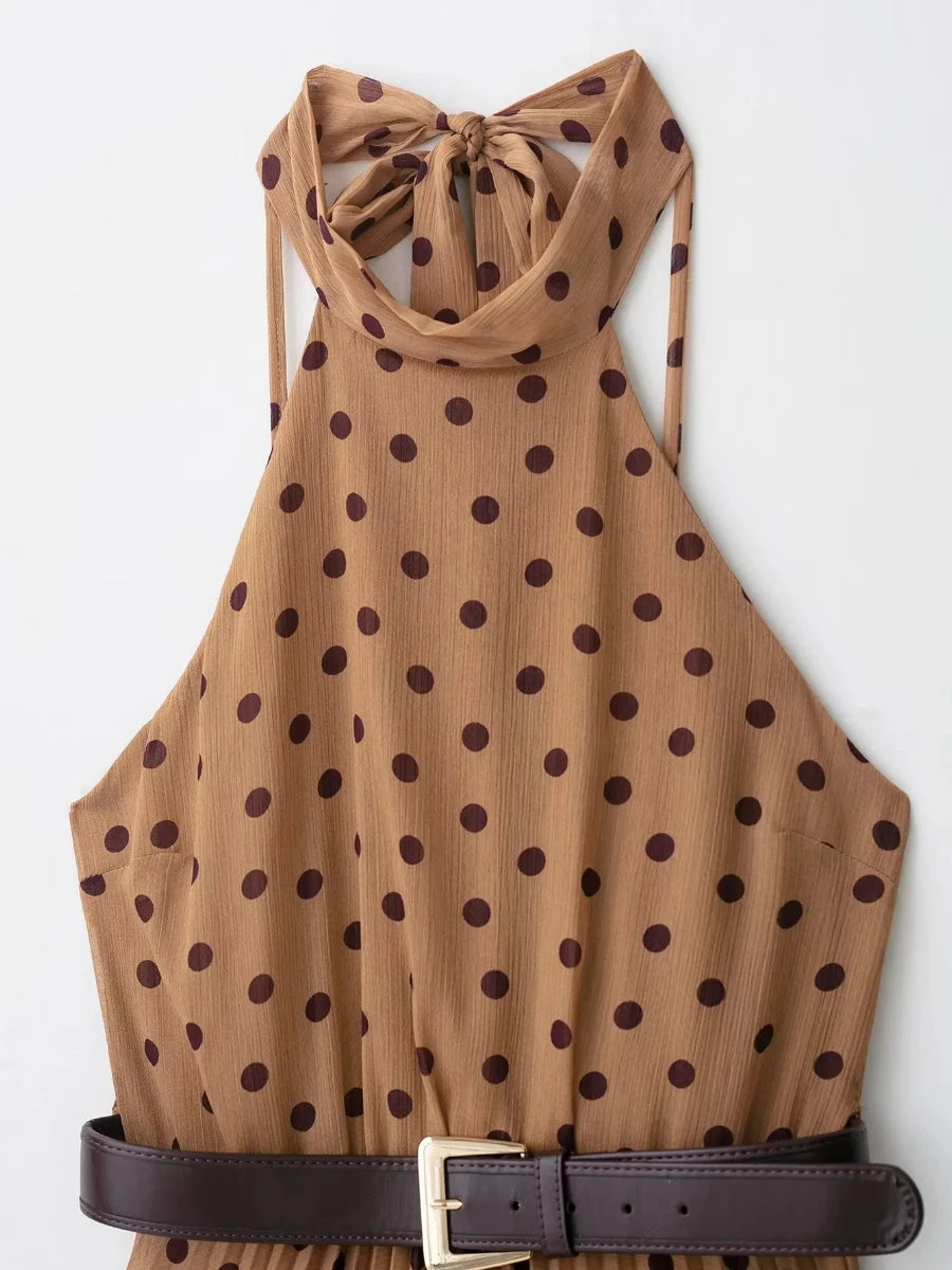 Brown polka dot halter top with a belt on a white background