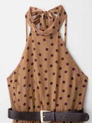 Brown polka dot halter top with a belt on a white background