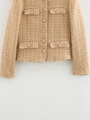 Beige tweed jacket on a light gray background