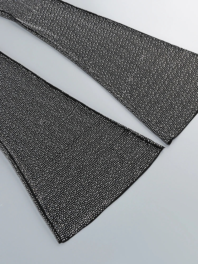 Two black textured ribbons on a light gray background