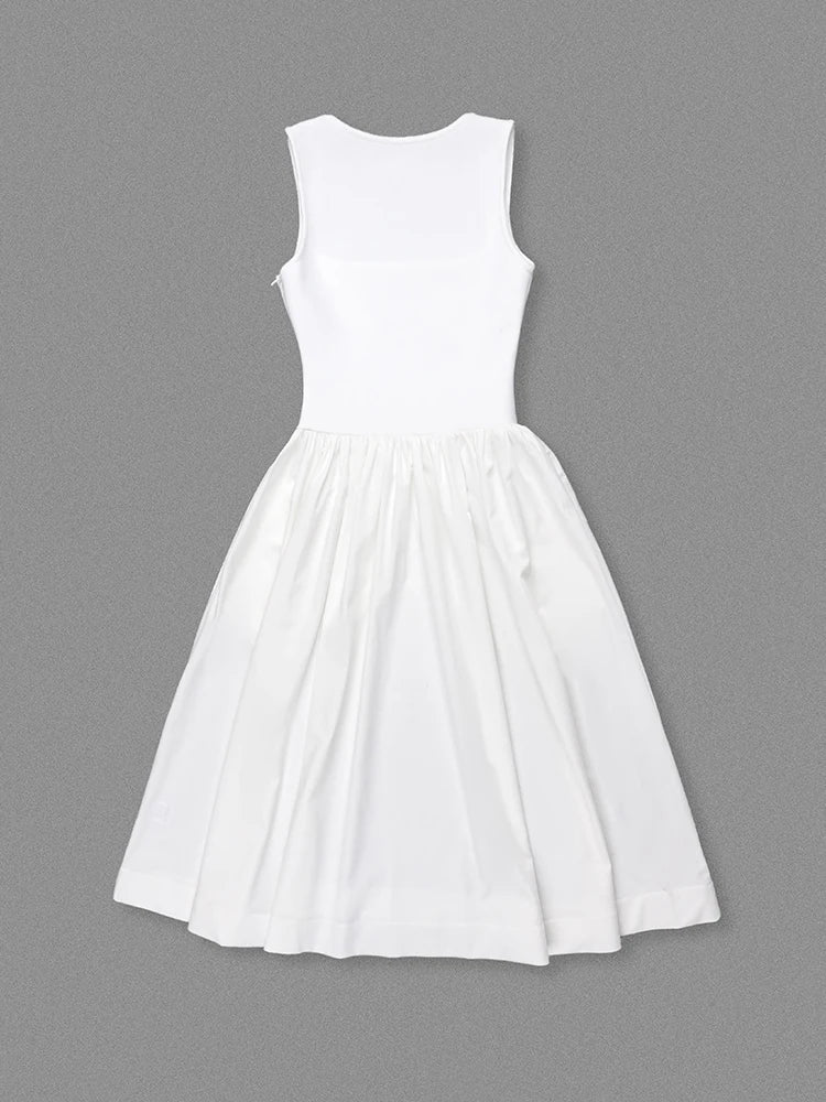 White sleeveless dress on a gray background