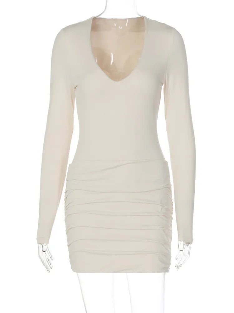 Beige long-sleeve dress on a white background