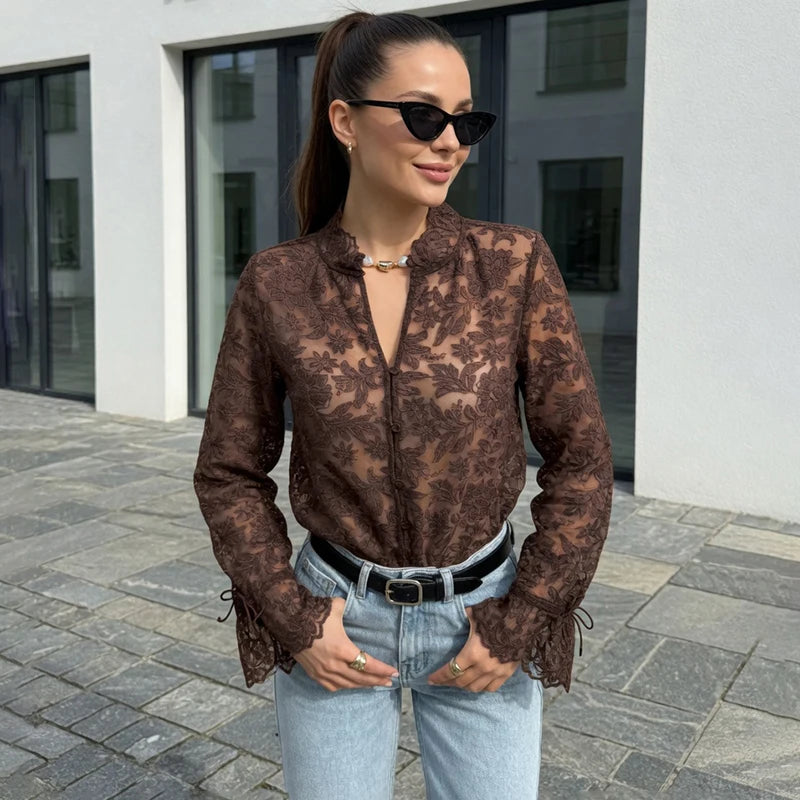 Sheer floral lace button-up top with flared cuffs