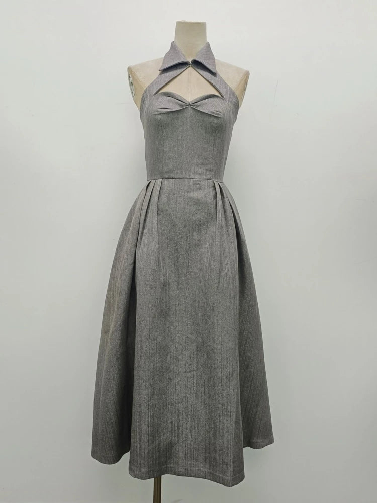Gray dress on a mannequin against a white background