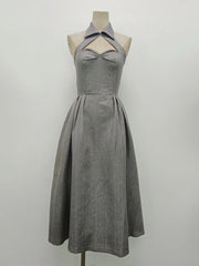 Gray dress on a mannequin against a white background