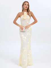 Woman wearing a white floral dress on a white background