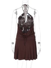 Brown dress on a transparent mannequin against a white background
