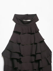 Black ruffled dress on a white background