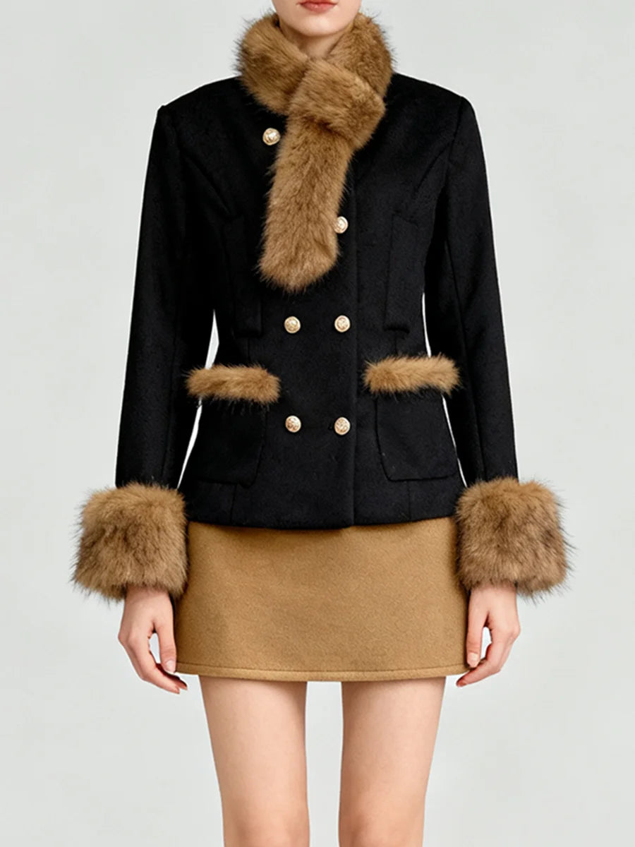 Black coat with fur trim and a brown skirt on a plain background