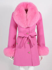 Pink coat with fur collar and cuffs on a white background