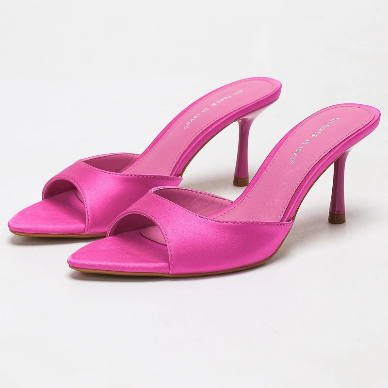 Pink satin pointed toe stiletto mules